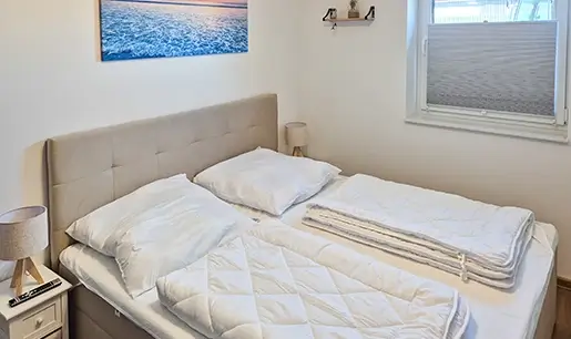 Ferienwohnung Herrlichkeit Schlafzimmer mit Bockspringbett